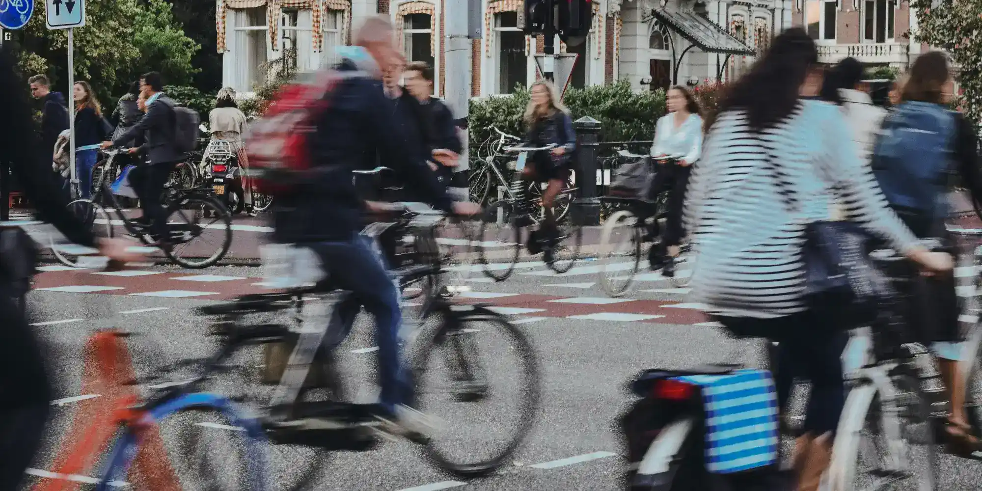 a busy european city embraces cycling and ebikes, replacing the congestion of cars